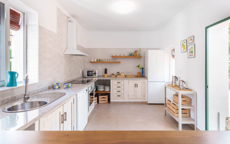 Kitchen with doors to gardens