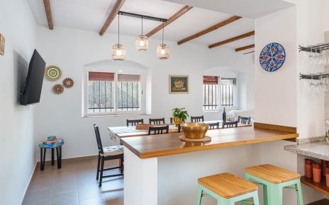 Dining area next to kitchen and breakfast table