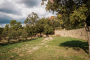 Ample fields below the house which are regularly maintained