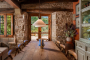 Dining area with doors opening to porch