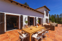 Open plan kitchen/dining/living opens to terrace