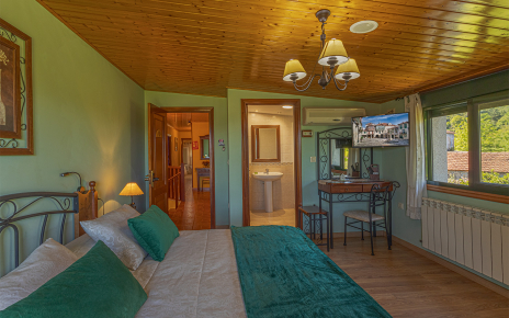 Dormitorio 1 con baño en suite