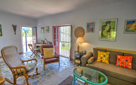 Living area on first floor with doors to terrace
