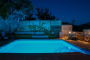 Your private swimming pool at night time