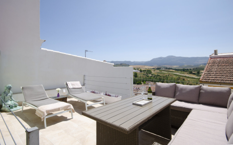 Zona para tomar el sol y tomar una copa