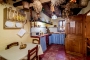An old cottage with a rustic kitchen